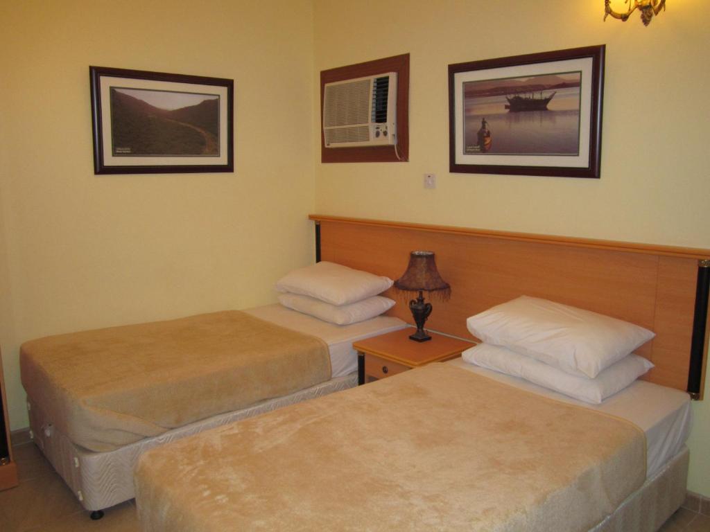 Muscat International Hotel Quarto foto